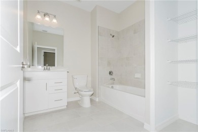 Step into luxury with this stunning Baycreek floorplan nestled on Panther Run Golf Club in Florida - for sale on GolfHomes.com, golf home, golf lot
