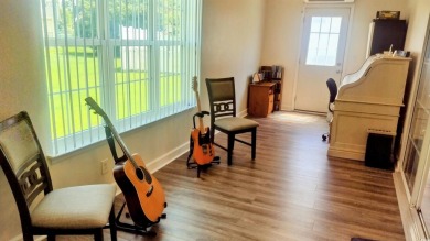 Nicely updated 3-bedroom, 2-bath home located in the Colonial on Palmetto Greens Golf and Country Club in South Carolina - for sale on GolfHomes.com, golf home, golf lot