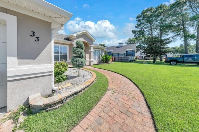 33 E Country Club Drive offers luxurious indoor living as well on Indian Bayou Golf and Country Club in Florida - for sale on GolfHomes.com, golf home, golf lot