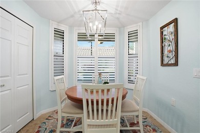 Turnkey Updated 2+Den End Unit with Golf & Lake Views | TPC on TPC At Treviso Bay in Florida - for sale on GolfHomes.com, golf home, golf lot