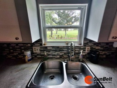 Charming 2 Bedroom / 2 Bath BARR Home in Rolling Greens Village on Rolling Greens Executive Golf Community in Florida - for sale on GolfHomes.com, golf home, golf lot