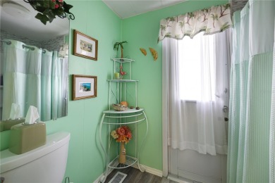 Cute and sassy - this may just be the one you need.  This home on Maple Leaf Golf and Country Club in Florida - for sale on GolfHomes.com, golf home, golf lot