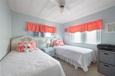 Cute and sassy - this may just be the one you need.  This home on Maple Leaf Golf and Country Club in Florida - for sale on GolfHomes.com, golf home, golf lot