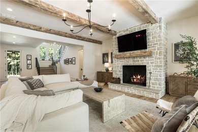 The epitome of right-sized luxury living awaits in this on Hawks Ridge Golf Club in Georgia - for sale on GolfHomes.com, golf home, golf lot
