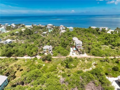 This well-priced North Captiva Island building lot is partially on Captiva Island Golf Club in Florida - for sale on GolfHomes.com, golf home, golf lot