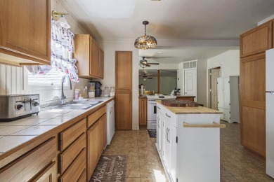 This beautifully updated Craftsman-style home is a true gem on Harbor Links Golf Course in Oregon - for sale on GolfHomes.com, golf home, golf lot