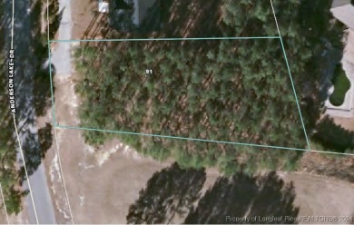 This 0.50-acre lot, one of the largest in Anderson Creek Club on Anderson Creek Golf Club in North Carolina - for sale on GolfHomes.com, golf home, golf lot