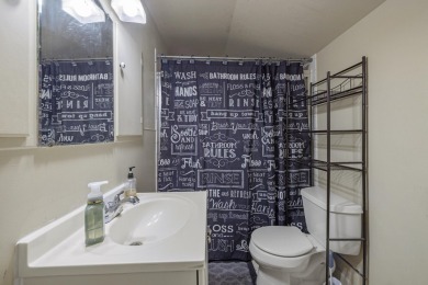 This beautifully updated Craftsman-style home is a true gem on Harbor Links Golf Course in Oregon - for sale on GolfHomes.com, golf home, golf lot