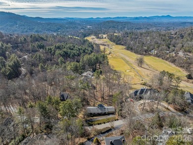Tucked along the fairways of the Country Club of Asheville, this on  in North Carolina - for sale on GolfHomes.com, golf home, golf lot