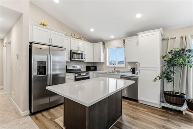 Welcome to 1004 Triumph Trail in Isanti, a beautifully designed on Sanbrook Golf Course in Minnesota - for sale on GolfHomes.com, golf home, golf lot