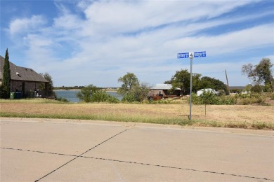 Build your dream house on a lot with beautiful views of the lake on Stewart Peninsula Golf Course in Texas - for sale on GolfHomes.com, golf home, golf lot