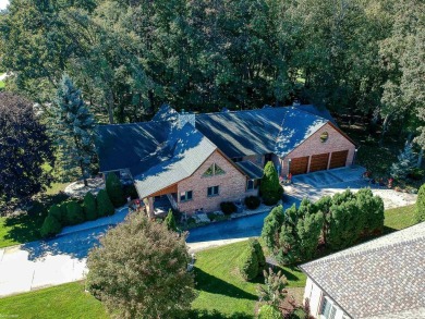 This stunning 3,900 square foot home is nestled on a picturesque on St Clair River Country Club in Michigan - for sale on GolfHomes.com, golf home, golf lot