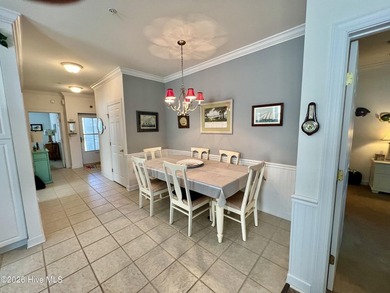 Beautifully decorated and fully furnished second-floor end unit on Sea Trail Golf Resort in North Carolina - for sale on GolfHomes.com, golf home, golf lot
