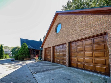 This stunning 3,900 square foot home is nestled on a picturesque on St Clair River Country Club in Michigan - for sale on GolfHomes.com, golf home, golf lot