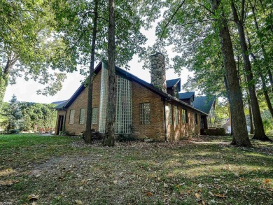 This stunning 3,900 square foot home is nestled on a picturesque on St Clair River Country Club in Michigan - for sale on GolfHomes.com, golf home, golf lot