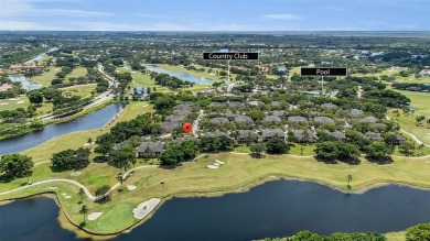 Spacious Coach Home with Golf Course Views in Weston Hills on Weston Hills Country Club in Florida - for sale on GolfHomes.com, golf home, golf lot