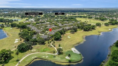 Spacious Coach Home with Golf Course Views in Weston Hills on Weston Hills Country Club in Florida - for sale on GolfHomes.com, golf home, golf lot