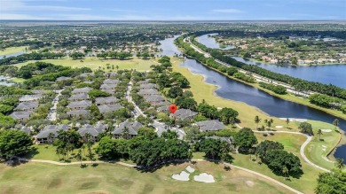 Spacious Coach Home with Golf Course Views in Weston Hills on Weston Hills Country Club in Florida - for sale on GolfHomes.com, golf home, golf lot