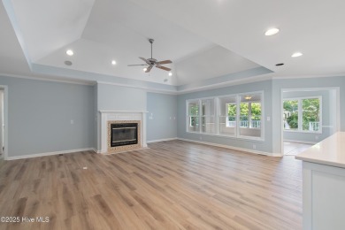Come explore this beautifully renovated 3,100-square-foot home on Sea Trail Golf Resort in North Carolina - for sale on GolfHomes.com, golf home, golf lot