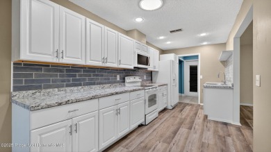 This fully updated 2 bedroom, 2 bathroom villa is located in the on Heather Golf and Country Club in Florida - for sale on GolfHomes.com, golf home, golf lot