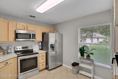 Here is your opportunity to own an end unit one-level townhome on Golf Club At Fleming Island in Florida - for sale on GolfHomes.com, golf home, golf lot