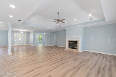 Come explore this beautifully renovated 3,100-square-foot home on Sea Trail Golf Resort in North Carolina - for sale on GolfHomes.com, golf home, golf lot