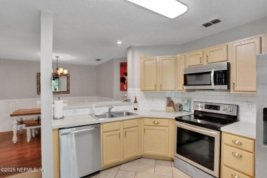 Here is your opportunity to own an end unit one-level townhome on Golf Club At Fleming Island in Florida - for sale on GolfHomes.com, golf home, golf lot