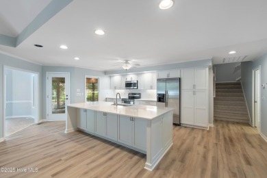 Come explore this beautifully renovated 3,100-square-foot home on Sea Trail Golf Resort in North Carolina - for sale on GolfHomes.com, golf home, golf lot