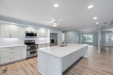 Come explore this beautifully renovated 3,100-square-foot home on Sea Trail Golf Resort in North Carolina - for sale on GolfHomes.com, golf home, golf lot