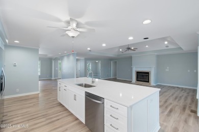 Come explore this beautifully renovated 3,100-square-foot home on Sea Trail Golf Resort in North Carolina - for sale on GolfHomes.com, golf home, golf lot