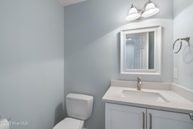 Come explore this beautifully renovated 3,100-square-foot home on Sea Trail Golf Resort in North Carolina - for sale on GolfHomes.com, golf home, golf lot