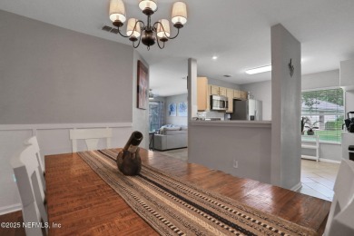 Here is your opportunity to own an end unit one-level townhome on Golf Club At Fleming Island in Florida - for sale on GolfHomes.com, golf home, golf lot