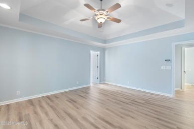 Come explore this beautifully renovated 3,100-square-foot home on Sea Trail Golf Resort in North Carolina - for sale on GolfHomes.com, golf home, golf lot