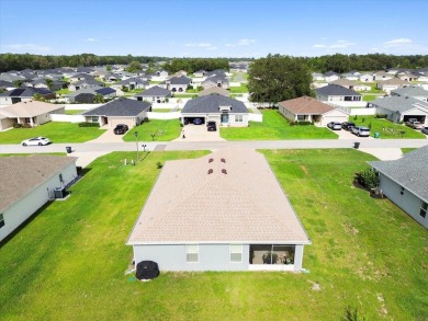 Welcome to 9020 SE 42nd Court--an inviting 3-bedroom, 2-bathroom on Baseline Golf Course in Florida - for sale on GolfHomes.com, golf home, golf lot
