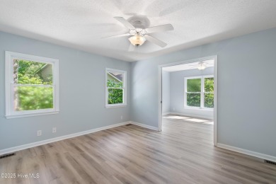 Come explore this beautifully renovated 3,100-square-foot home on Sea Trail Golf Resort in North Carolina - for sale on GolfHomes.com, golf home, golf lot