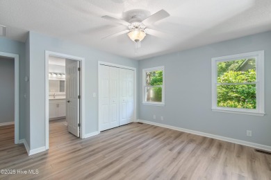 Come explore this beautifully renovated 3,100-square-foot home on Sea Trail Golf Resort in North Carolina - for sale on GolfHomes.com, golf home, golf lot