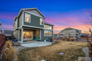 This stunning 2-story home in Windsor's sought-after RainDance on Raindance National Golf Course in Colorado - for sale on GolfHomes.com, golf home, golf lot