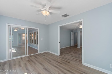 Come explore this beautifully renovated 3,100-square-foot home on Sea Trail Golf Resort in North Carolina - for sale on GolfHomes.com, golf home, golf lot