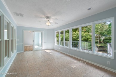 Come explore this beautifully renovated 3,100-square-foot home on Sea Trail Golf Resort in North Carolina - for sale on GolfHomes.com, golf home, golf lot