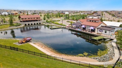 This stunning 2-story home in Windsor's sought-after RainDance on Raindance National Golf Course in Colorado - for sale on GolfHomes.com, golf home, golf lot