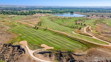 This stunning 2-story home in Windsor's sought-after RainDance on Raindance National Golf Course in Colorado - for sale on GolfHomes.com, golf home, golf lot