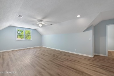 Come explore this beautifully renovated 3,100-square-foot home on Sea Trail Golf Resort in North Carolina - for sale on GolfHomes.com, golf home, golf lot