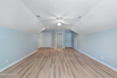 Come explore this beautifully renovated 3,100-square-foot home on Sea Trail Golf Resort in North Carolina - for sale on GolfHomes.com, golf home, golf lot