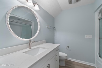 Come explore this beautifully renovated 3,100-square-foot home on Sea Trail Golf Resort in North Carolina - for sale on GolfHomes.com, golf home, golf lot