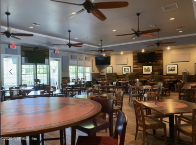Here is your opportunity to own an end unit one-level townhome on Golf Club At Fleming Island in Florida - for sale on GolfHomes.com, golf home, golf lot