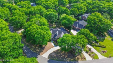 Come explore this beautifully renovated 3,100-square-foot home on Sea Trail Golf Resort in North Carolina - for sale on GolfHomes.com, golf home, golf lot