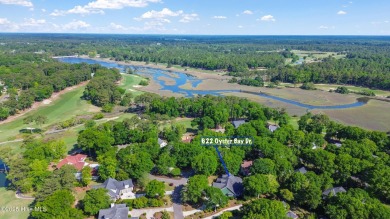 Come explore this beautifully renovated 3,100-square-foot home on Sea Trail Golf Resort in North Carolina - for sale on GolfHomes.com, golf home, golf lot