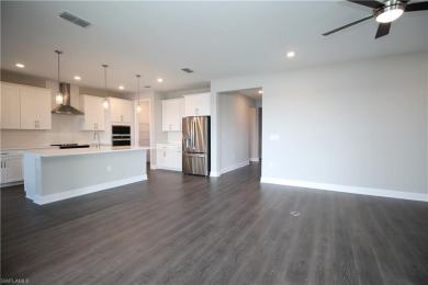 Gorgeous newer home in Valencia Lakes bult in 2022.  Available on Valencia Golf and Country Club in Florida - for sale on GolfHomes.com, golf home, golf lot