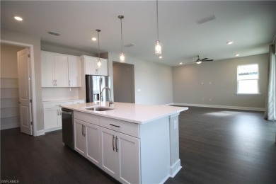 Gorgeous newer home in Valencia Lakes bult in 2022.  Available on Valencia Golf and Country Club in Florida - for sale on GolfHomes.com, golf home, golf lot
