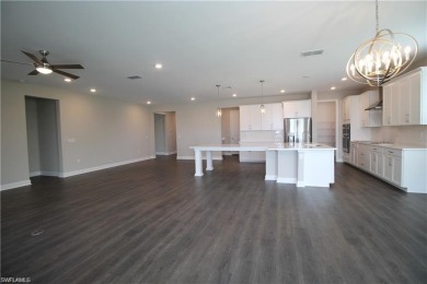 Gorgeous newer home in Valencia Lakes bult in 2022.  Available on Valencia Golf and Country Club in Florida - for sale on GolfHomes.com, golf home, golf lot